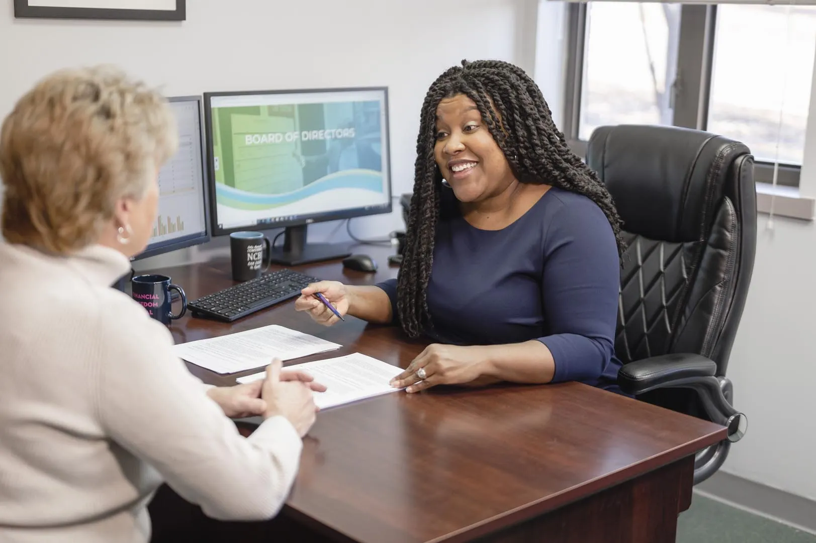 Bankruptcy attorney Veronica Brown-Moseley helping a client with foreclosure prevention